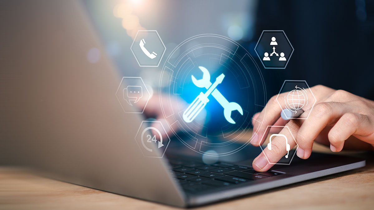 user using digital tools on laptop